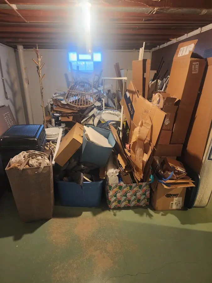 Roll-off dumpster container at job site for 15 Yard Dumpster Rental in Red Bud